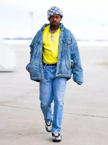 Balenciaga Black Eyelet Le Cagole Belt worn by Stefon Diggs on the Instagram account @blitzfits