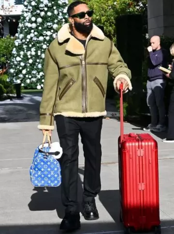Supreme x Rimowa Red Topas 45L Rolling Luggage worn by Odell Beckham Jr. on the Instagram account @blitzfits