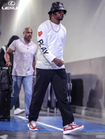 Prada Patent Red & Silver Americas Cup Sneakers worn by Lamar Jackson on the Instagram account @ravens