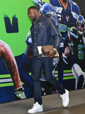 Cartier Or Jaune & Santos Blanc porté par DK Metcalf sur le compte Instagram @seahawks