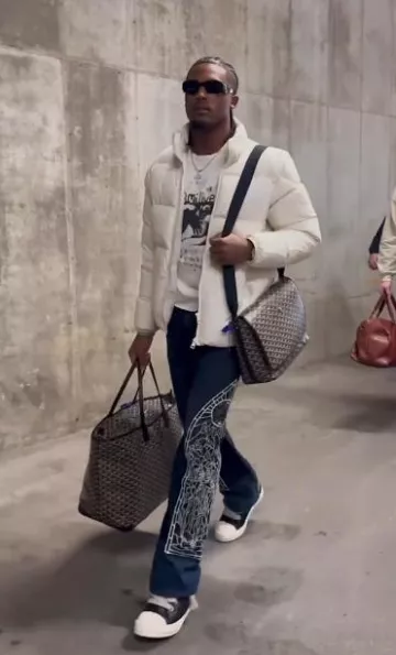 Moncler Ivory Akishima Down Jacket worn by Tee Higgins on the Instagram account @bengals