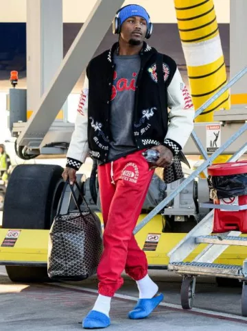 Bolso Tote Goyard Black Artois MM usado por Tee Higgins en la cuenta de Instagram @bengals