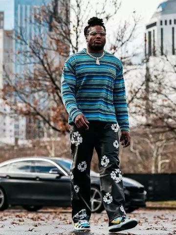 Dior Tears Blue Striped Mohair Sweater worn by Derrick Henry on the Instagram account @titans