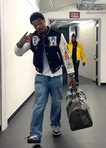 Off White Royal Blue & Grey Floating Arrow Sneakers worn by Derwin James Jr. on the Instagram account @chargers