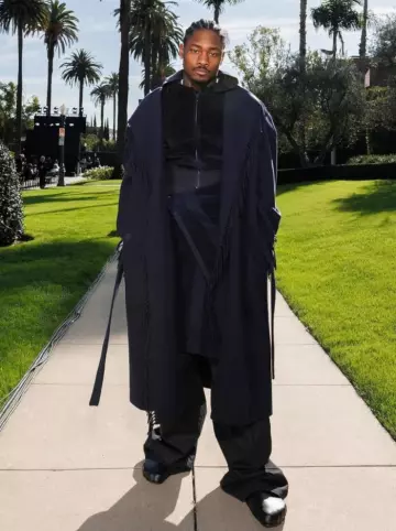 Balenciaga Navy Blue Hooded Fringed Coat worn by Stefon Diggs on the Instagram account @stefondiggs