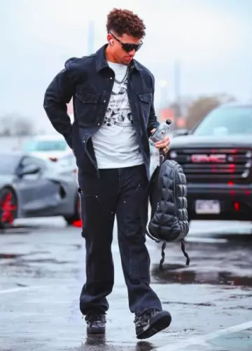 Louis Vuitton Black Faded Monogram Carpenter Jeans worn by Patrick Mahomes II on the Instagram account @chiefs