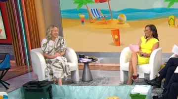 DKNY Printed Pleated Cotton Voile Midi Skirt worn by Lauren Iannotti as seen in CBS Mornings on July 2, 2025