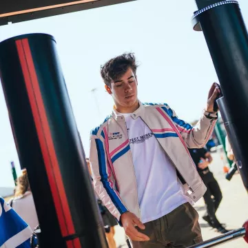 Franco Colapinto Unisex Alpine Racer Jacket worn by (Franco Colapinto) in glowsainz