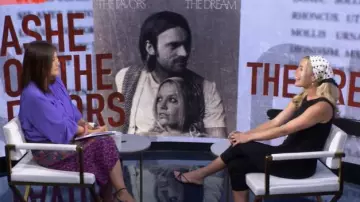 J. Crew Floral Midi Wrap Skirt in Purple worn by Juju Chang as seen in Good Morning America on July 11, 2025