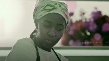 The Cary Collection "Calories Framed Linen c1950s Pocket Square" worn by Sydney Adamu (Ayo Edebiri) as seen in The Bear (S03E02)