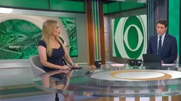 Karen Millen Cap Sleeve Scuba Crepe Belted Midi Pencil Dress worn by Kelly O'Grady as seen in CBS Mornings on July 16, 2025