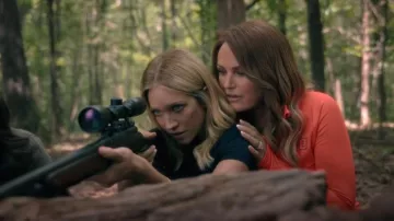 She Orange Quarter Zip Pullove worn by Margo Banks (Malin Åkerman) as seen in The Hunting Wives (S01E03)