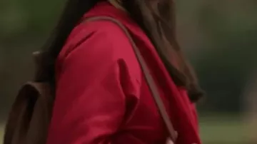 The Summer I Turned Pretty Lola Tung Red Jacket worn by Isabel 'Belly' Conklin (Lola Tung) in The Summer I Turned Pretty (S03)