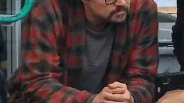 One Battle After Another Leonardo DiCaprio Checkered Coat worn by Bob Ferguson (Leonardo DiCaprio) in The Battle of Baktan Cross