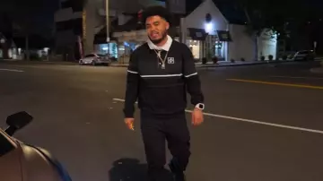 Louis Vuitton Black Monogram Long Sleeve Polo Top worn by Tommy Brown as seen in Hitmakers (S01E06)