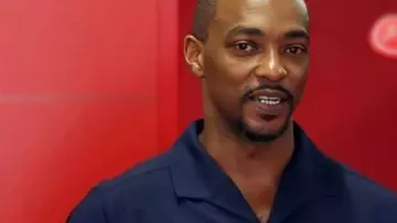 Hungary F1 Grand Prix 2025 Ferrari Shirt worn by Anthony Mackie in Anthony Mackie was spotted chatting with F1 legend Lewis Hamilton at the Hungarian Grand Prix