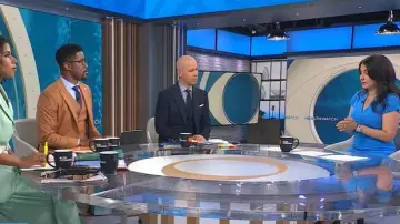 Me + Em Fluid Crepe Jersey Pleat Front Maxi Dress worn by Celine Gounder as seen in CBS Mornings on July 31, 2025