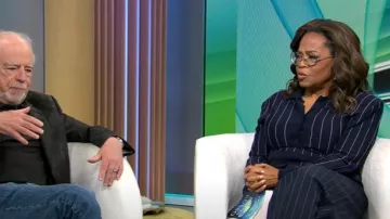Stella McCartney Pinstripe Long Sleeve Virgin Wool Crop Polo worn by Oprah Winfrey as seen in CBS Mornings on August 5, 2025