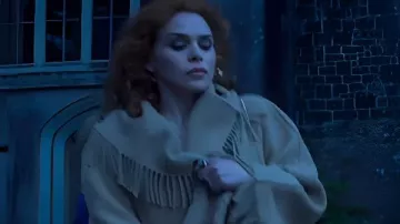 This Brown Fringe Coat worn by Isadora Capri (Billie Piper) in Wednesday (S02E04)