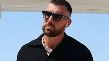 This Black Knit Polo Shirt worn by Travis Kelce in Chiefs vs Cardinals Game 10|Aug|2025