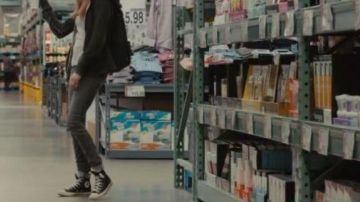 The pair of Converse All Star Mid Black in The Hidden Face of Margo