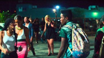 The backpack printed Herschel Supply Co. worn by Malcolm (Shameik Moore) in the film Dope