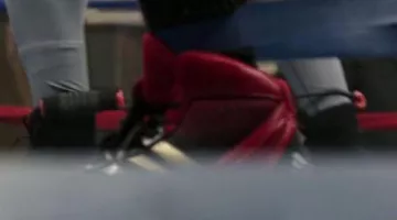 The Adidas Wrestling Response 3.1 Red sneakers worn by Adonis Creed's sparring partner in the movie Creed: The Legacy of Rocky Balboa