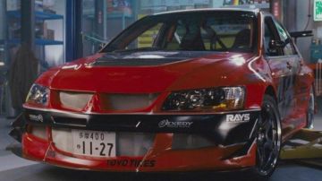 La supercar Mitsubishi Lancer Evolution en rouge de Han Lue (Sung Kang) dans Fast and the Furious : Tokyo Drift