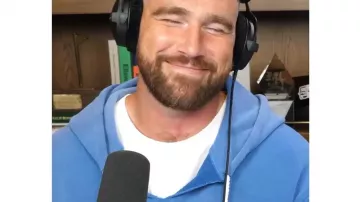 Miracle Cut Off Hoodie of Travis Kelce in New Heights with Jason and Travis Kelce