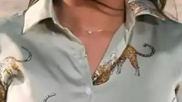 Blouse à imprimé guépard portée par Morgan Norwood vue dans Good Morning America