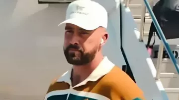 This Rugby Polo Shirt worn by Travis Kelce in Travis Kelce & Patrick Mahomes Land in Seattle in Style To Face Seahawks—#nfl#viral