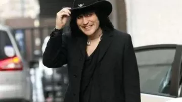 Bake Off 2023 Noel Fielding Black Trench Coat of Self - Presenter (Noel Fielding) in The Great British Bake Off (S06)