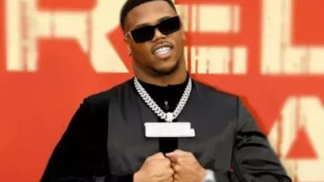 NFL Draft Red Carpet Long Coat worn by Abdul Carter in the YouTube video NFL DRAFT: Red Carpet (pt.2)