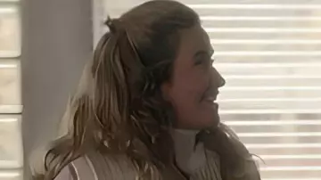 Resident Alien S04 White Heart Sweater Vest worn by (Jenna Lamia) as seen in Resident Alien (S04E03)