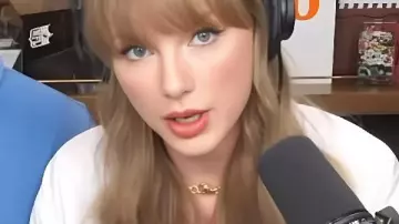 Taylor Swift New Heights Podcast White Shirt in Taylor Swift on Reclaiming Her Masters, Wrapping The Eras Tour, and The Life of a Showgirl | NHTV