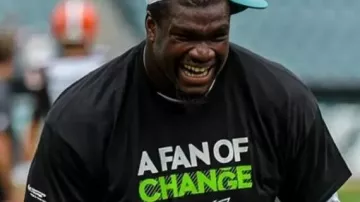 Philadelphia Eagles A Fan Of Change T-Shirt worn by Jalen Hurts in the YouTube video Eagles 2024 Super Bowl HYPE VIDEO