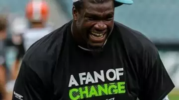 Philadelphia Eagles A Fan Of Change T-Shirt worn by Jalen Hurts in the YouTube video Eagles 2024 Super Bowl HYPE VIDEO
