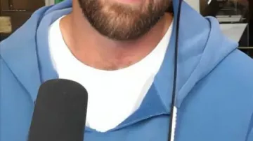 Blue Miracle Cut Off Hoodie worn by Travis Kelce