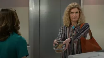 Hobo Joni Studded Bag in Cognac worn by Jan Morgan (Jerri Tubbs) as seen in Beyond the Gates (S01E109)