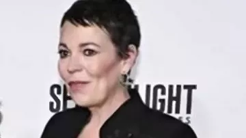 This Embellished Flower Blazer Jacket worn by Olivia Colman in Good Morning America