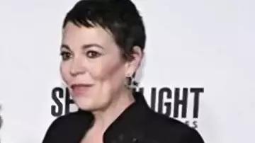 This Embellished Flower Blazer Jacket worn by Olivia Colman in Good Morning America