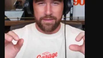 Travis Kelce Podcast Easter Eggs White Shirt of Travis Kelce in New Heights with Jason and Travis Kelce