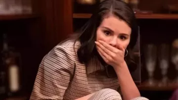 Only Murders In The Building Plaid Polo Top worn by Mabel Mora (Selena Gomez) as seen in Only Murders in the Building (S05E01)