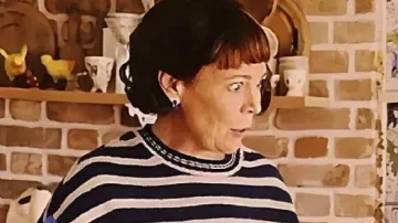 The Roses Multicolor Sweater worn by Ivy (Olivia Colman) as seen in The Roses