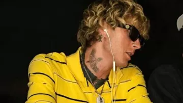 The League Yellow Stripe Sweatshirt worn by Machine Gun Kelly as seen in The League