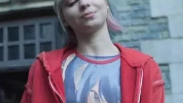 Wednesday S02 Emma Myers Anime Raglan Tee worn by Enid Sinclair (Emma Myers) in Wednesday (S02)