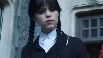 Wednesday Black Polo Shirt worn by Wednesday Addams / Goody Addams (Jenna Ortega) as seen in Wednesday (S02E08)