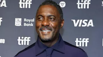 Toronto International Film Festival Blue Satin Shirt worn by Idris Elba in Idris Elba talks about working with Seal during TIFF Tribute Awards