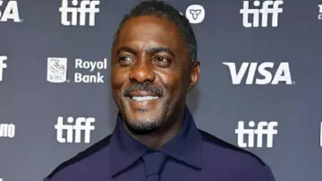 Toronto International Film Festival Blue Satin Shirt worn by Idris Elba in Idris Elba talks about working with Seal during TIFF Tribute Awards