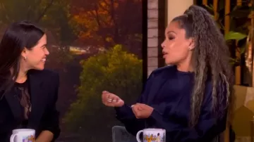 Stella McCartney Satin Twist Front Long Sleeve Midi Dress worn by Sunny Hostin as seen in The View on September 11, 2025